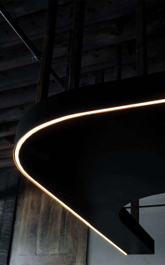 The Dark Bronze Metal structure is suspended using reclaimed Hinoki (a Japanese Cypress) with its contemporary gentle curb and continuous LED strip, the Soffit juxtaposes the traditional materials.