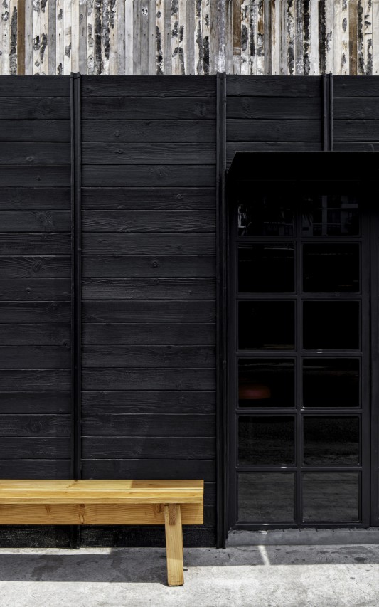 a wonderful juxtaposition of the existing building. The facade gently conquers its surroundings and creates a noticeable language for nearby residents to stumble into a piece of Japan in their community.