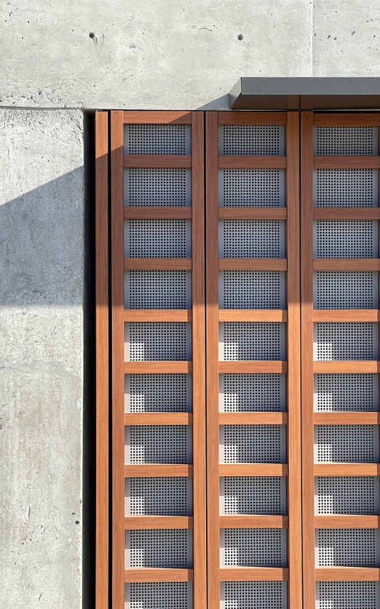 The garage's facade was inspired by the wooden planks used when casting concrete.